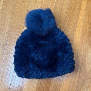 Brand new w/tag Pologeorgis Deep Blue Furry Women’s Hat with Pom-Pom
